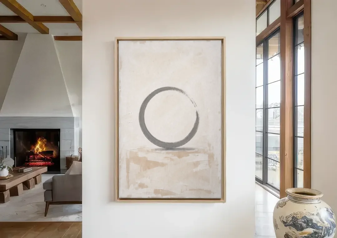Minimal Wall Art of an Open Graphite Circle canvas wall art in a living room with a fireplace
