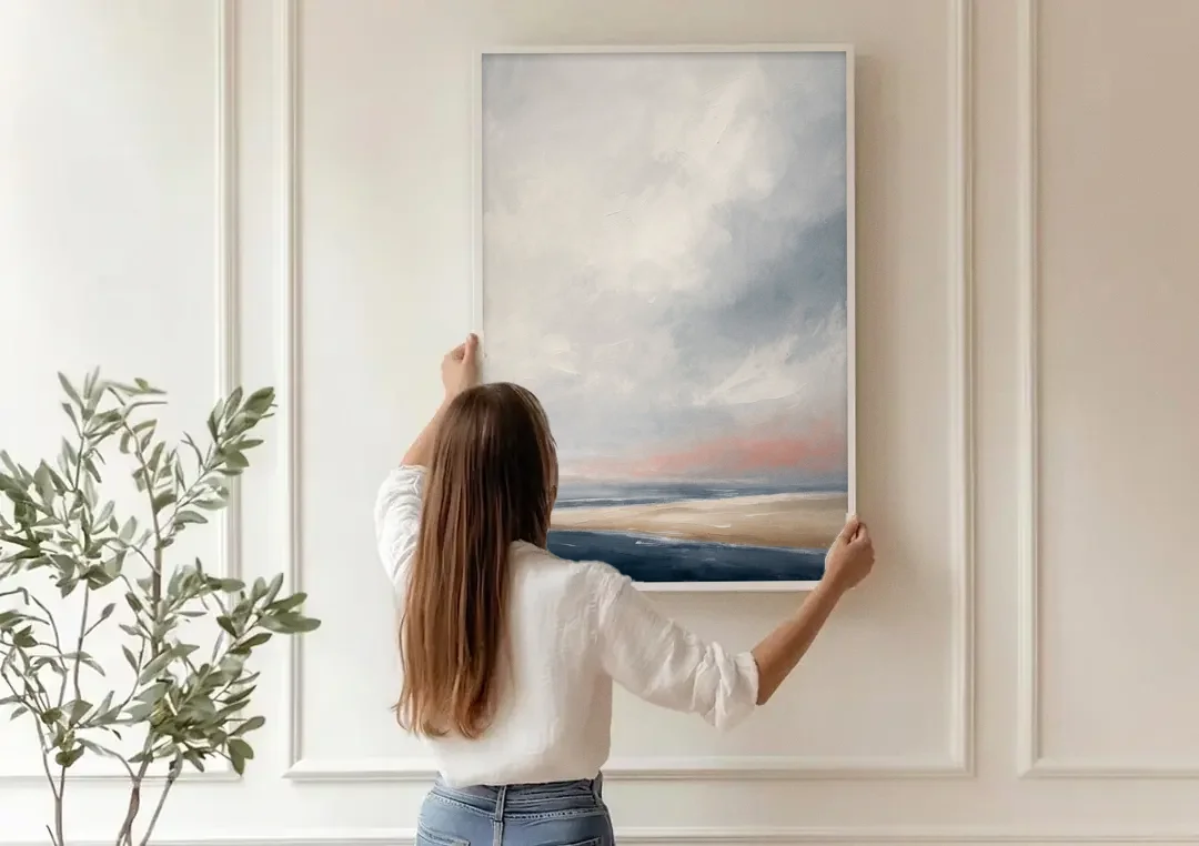 Minimalist Abstract Chalk Sky Over a Sandbar canvas wall art being hung on a paneled wall