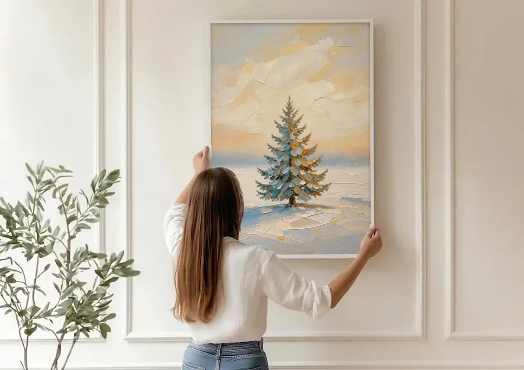 Neutral Minimalist Christmas Tree Art on Ivory Snow canvas wall art being hung on a paneled wall
