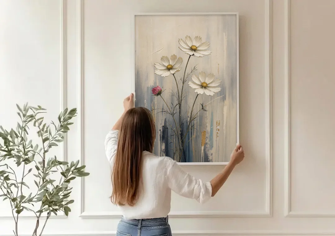 Minimalist Floral Wall Art with White Cosmos canvas wall art being hung on a paneled wall