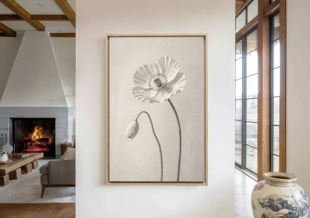 Minimalist Flower Wall Art of a Poppy and Bud canvas wall art in a living room with a fireplace