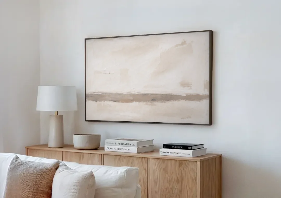 Minimalist Neutral Wall Art with Taupe Dawn Horizon canvas wall art above a wooden sideboard next to a sofa