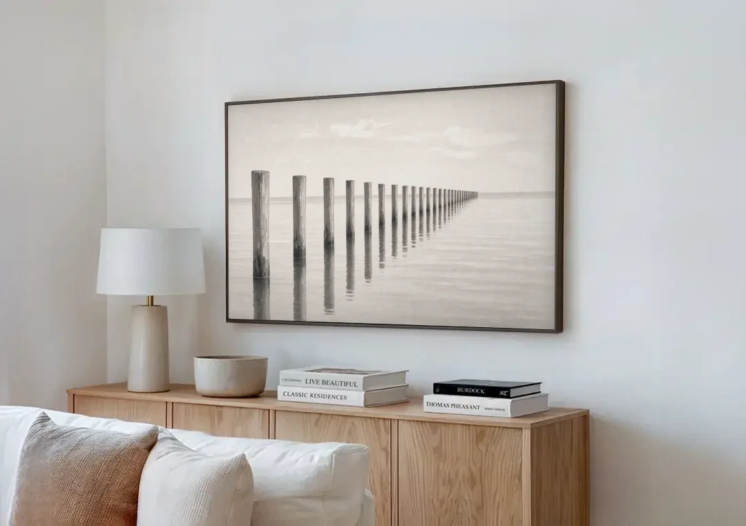 Minimalist Office Wall Art of Old Pier Pilings canvas wall art above a wooden sideboard next to a sofa
