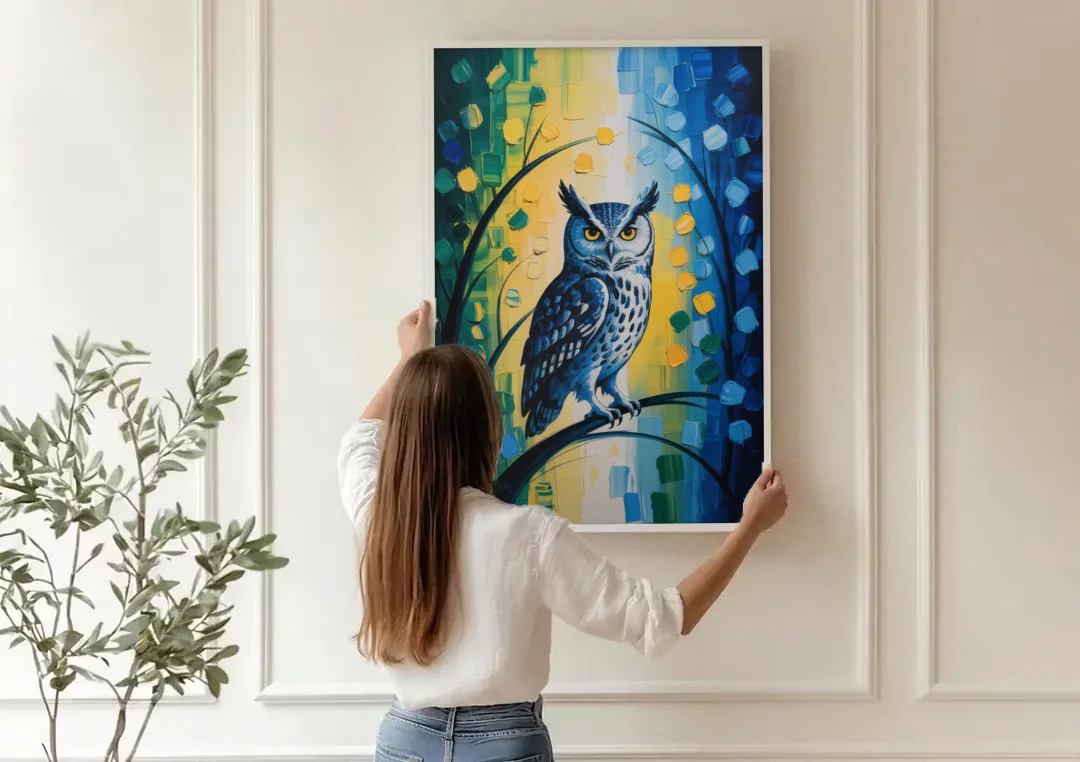 Minimalist Owl Silhouette canvas wall art being hung on a paneled wall