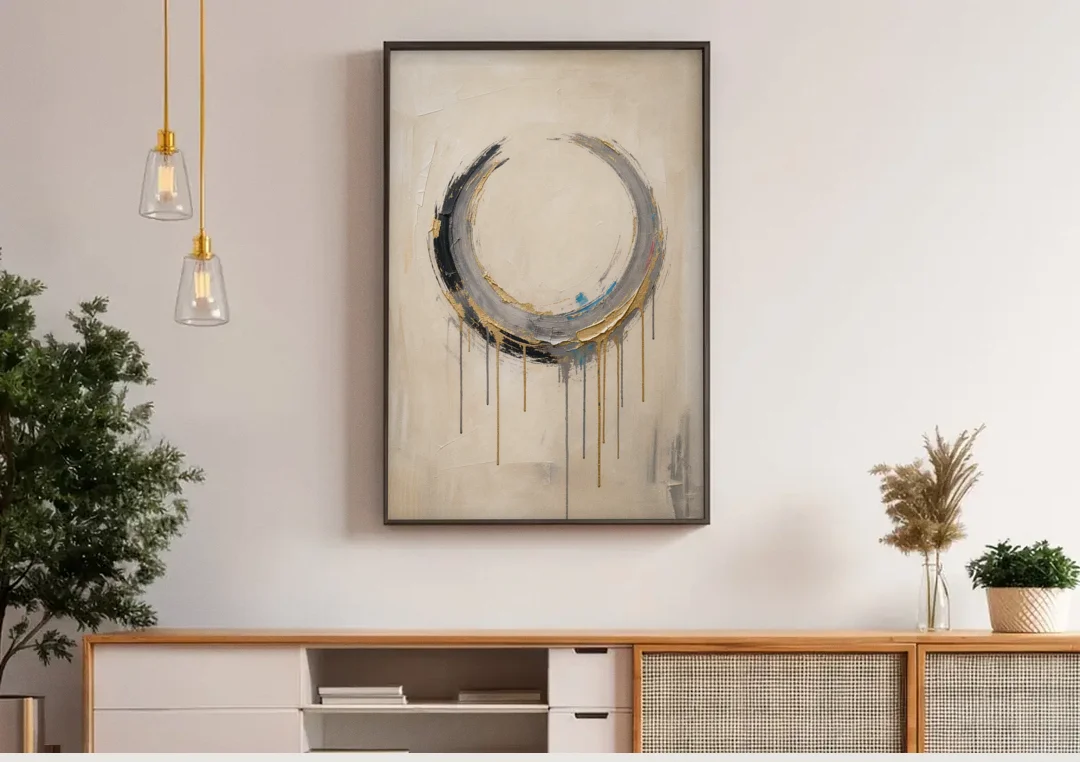 Minimalist Textured Gilded Enso Circle canvas wall art above a wooden sideboard under pendant lights