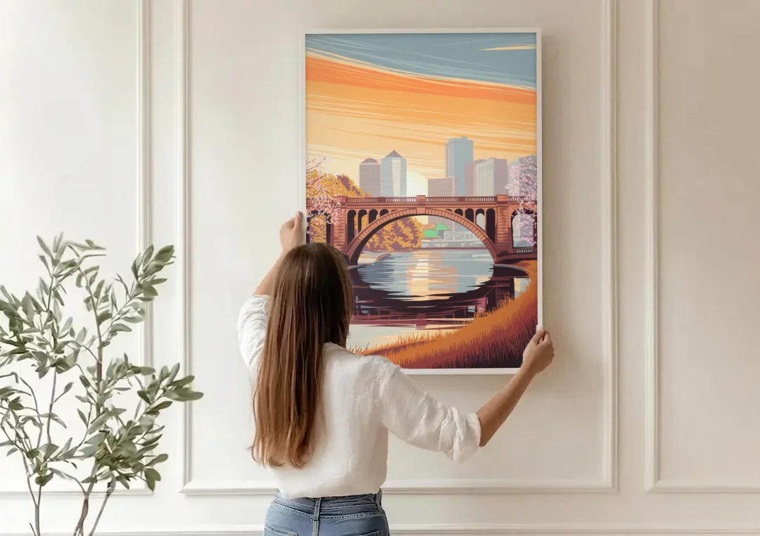 Minneapolis Iconic Stone Arch Bridge canvas wall art being hung on a paneled wall