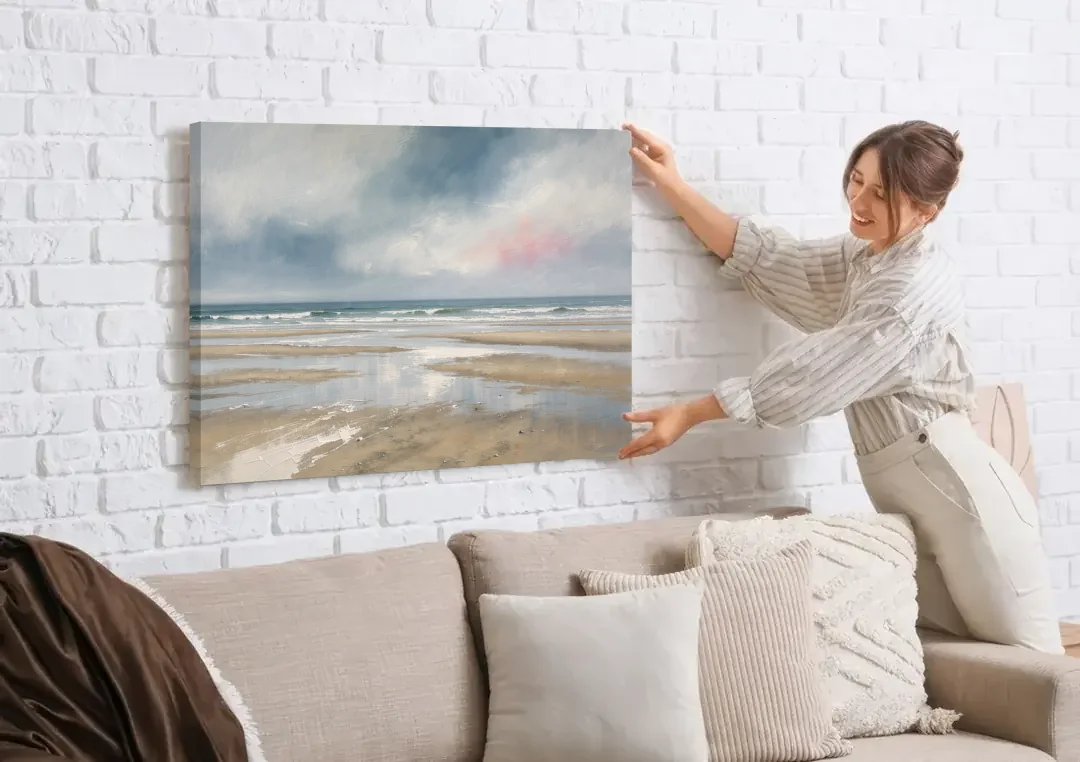 Mirrored Tide Pools at Low Tide Above the Headboard canvas wall art being hung on a white brick wall above a sofa