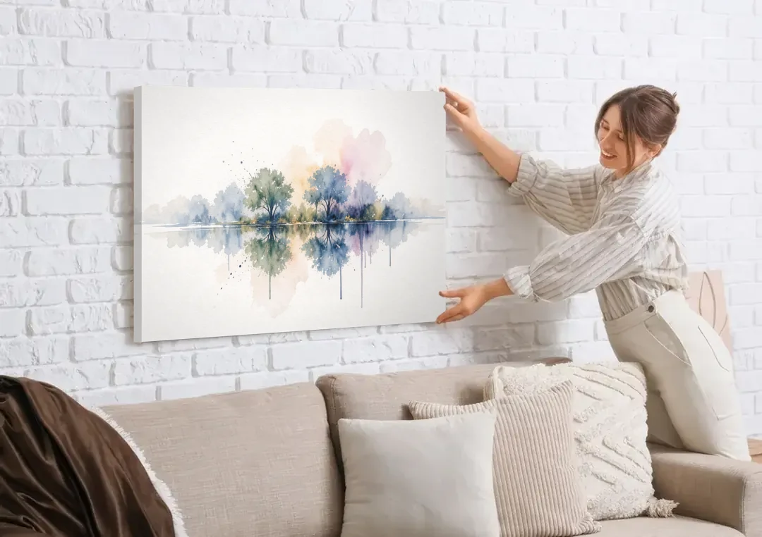 Misty Lake Painting with Mirrored Trees canvas wall art being hung on a white brick wall above a sofa