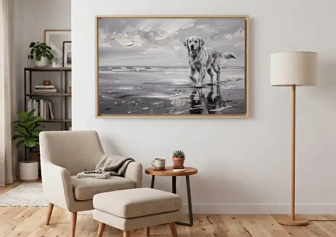 Misty Shore Golden Retriever in Black and White canvas wall art above an armchair in a bright living room