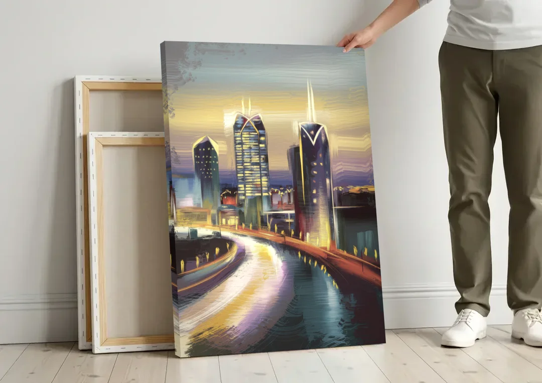 Mobile Downtown Aesthetic canvas wall art leaning against a wall next to blank canvases