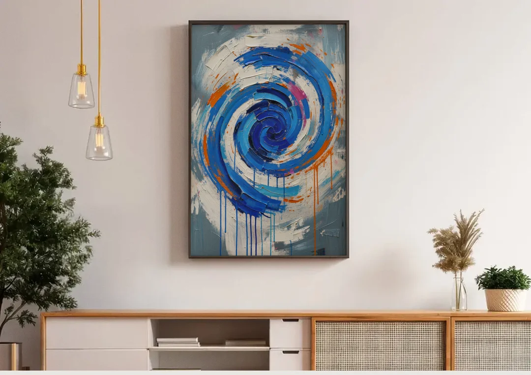 Modern Abstract Canvas Wall Art of a Cobalt Whirlpool canvas wall art above a wooden sideboard under pendant lights