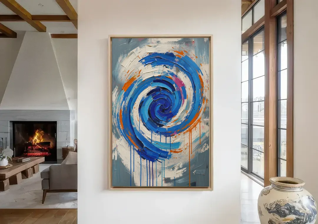 Modern Abstract Canvas Wall Art of a Cobalt Whirlpool canvas wall art in a living room with a fireplace