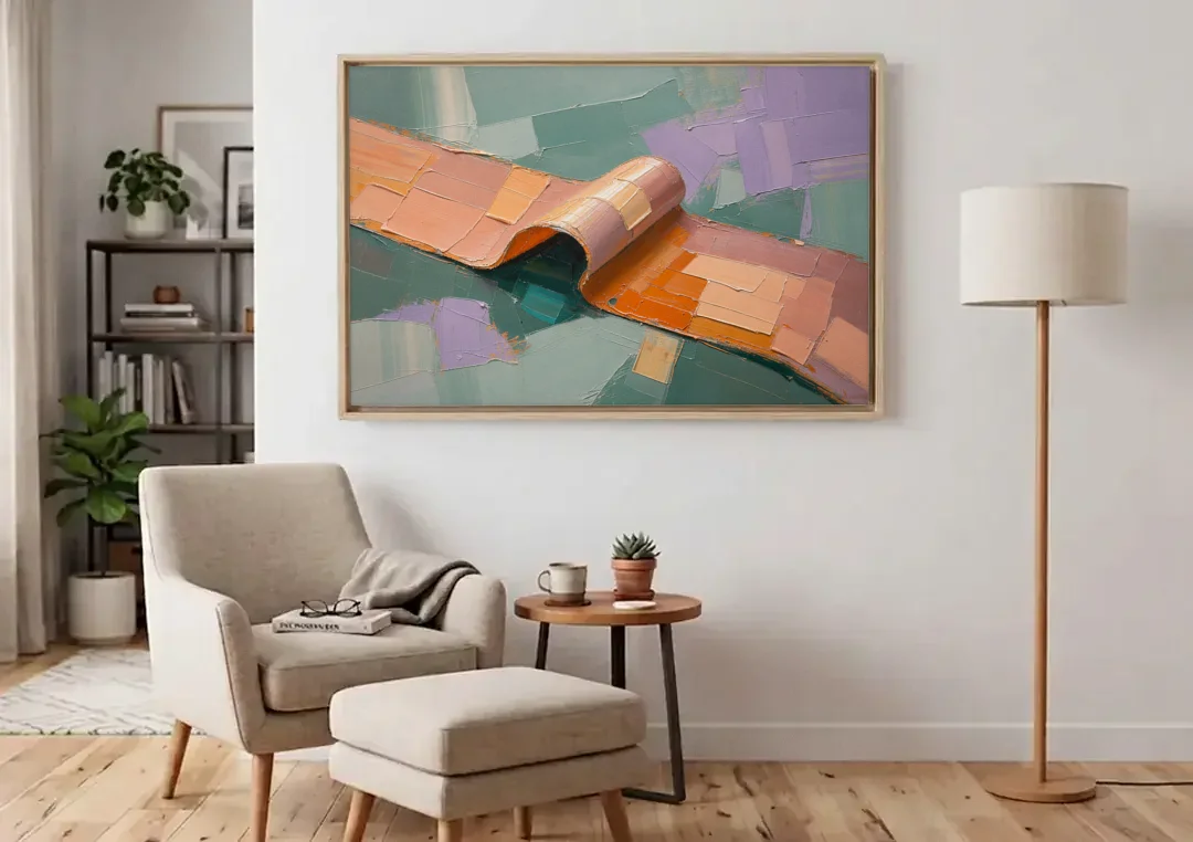 Modern Abstract Painting with Rolling Peach Ribbon canvas wall art above an armchair in a bright living room