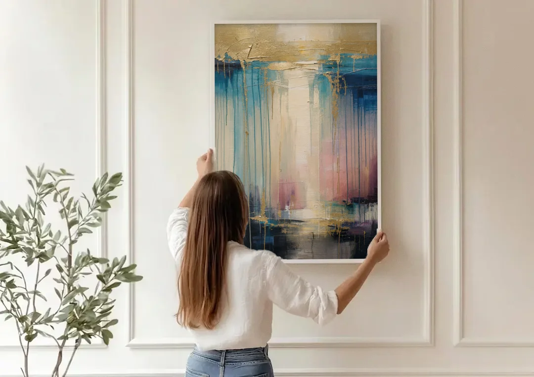 Modern Abstract Teal and Gold Veil Rain canvas wall art being hung on a paneled wall