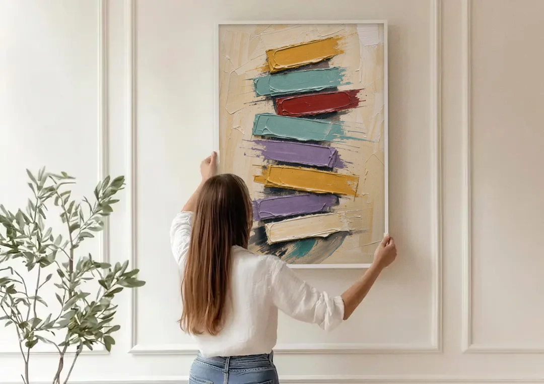 Modern Art Canvas Crimson Keystone Stack canvas wall art being hung on a paneled wall