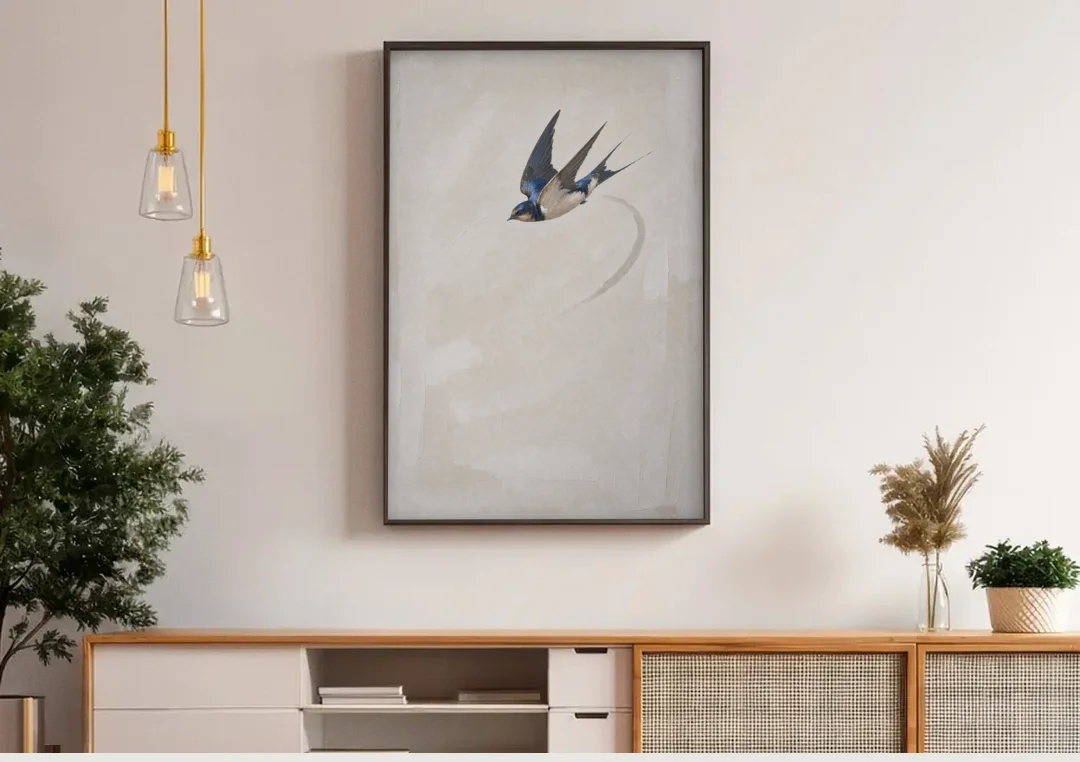 Modern Bird Painting of a Diving Barn Swallow canvas wall art above a wooden sideboard under pendant lights