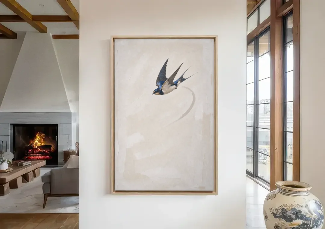 Modern Bird Painting of a Diving Barn Swallow canvas wall art in a living room with a fireplace