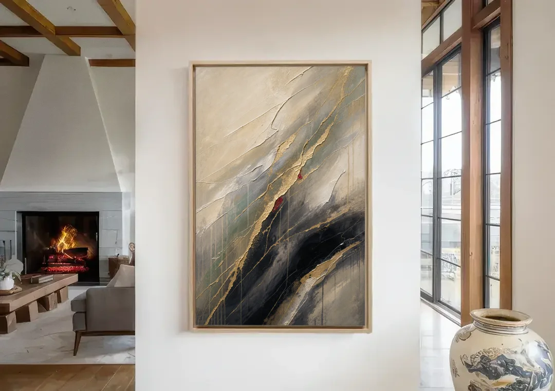 Modern Black and Gold Abstract Marble Veins canvas wall art in a living room with a fireplace