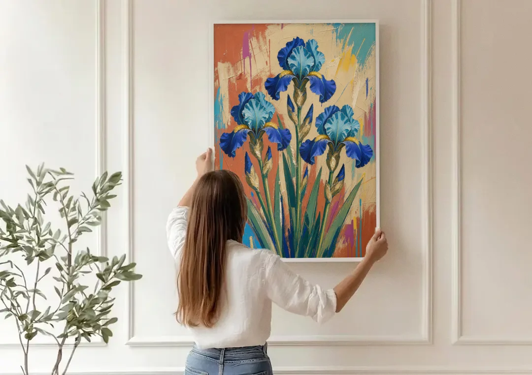 Modern Botanical Wall Art of Blue Irises on Terracotta canvas wall art being hung on a paneled wall