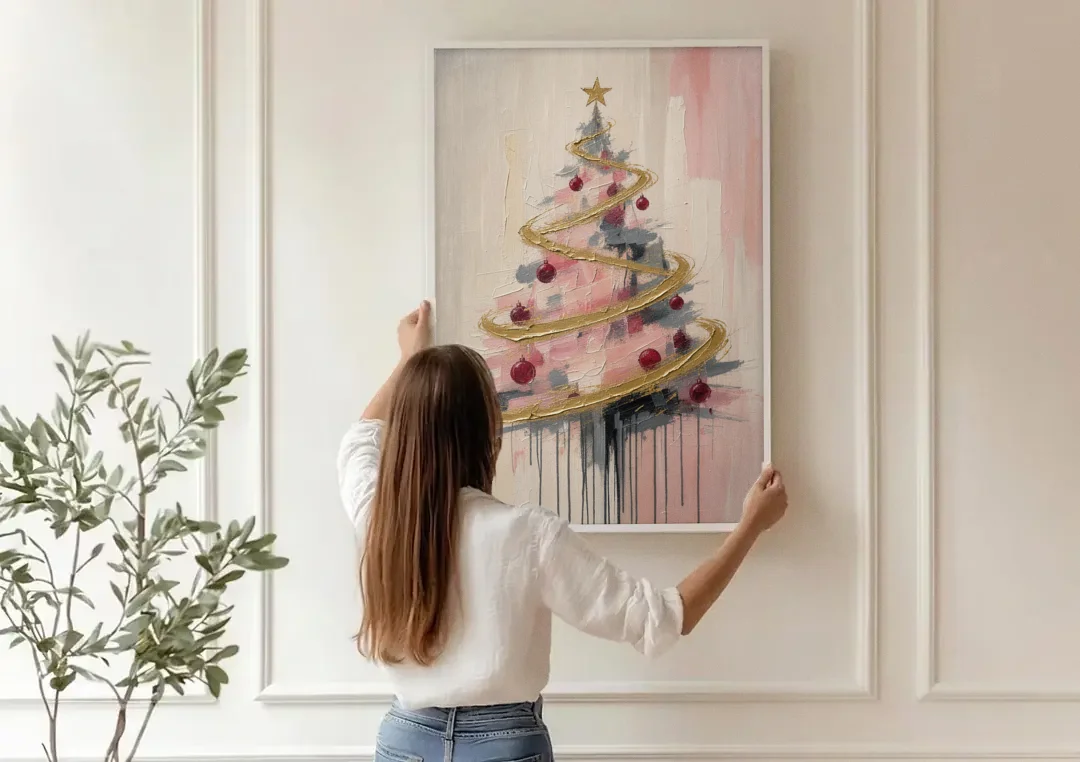 Modern Christmas Tree Painting with Gold Spiral canvas wall art being hung on a paneled wall