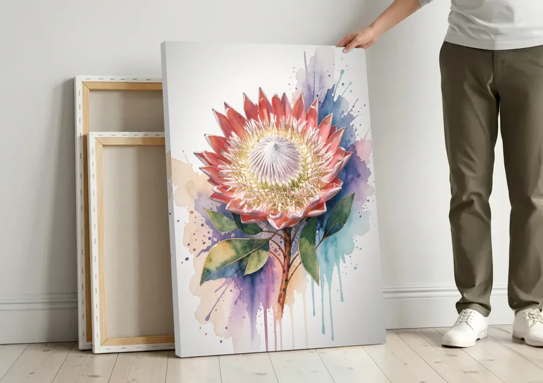 Modern Floral King Protea Crown canvas wall art leaning against a wall next to blank canvases