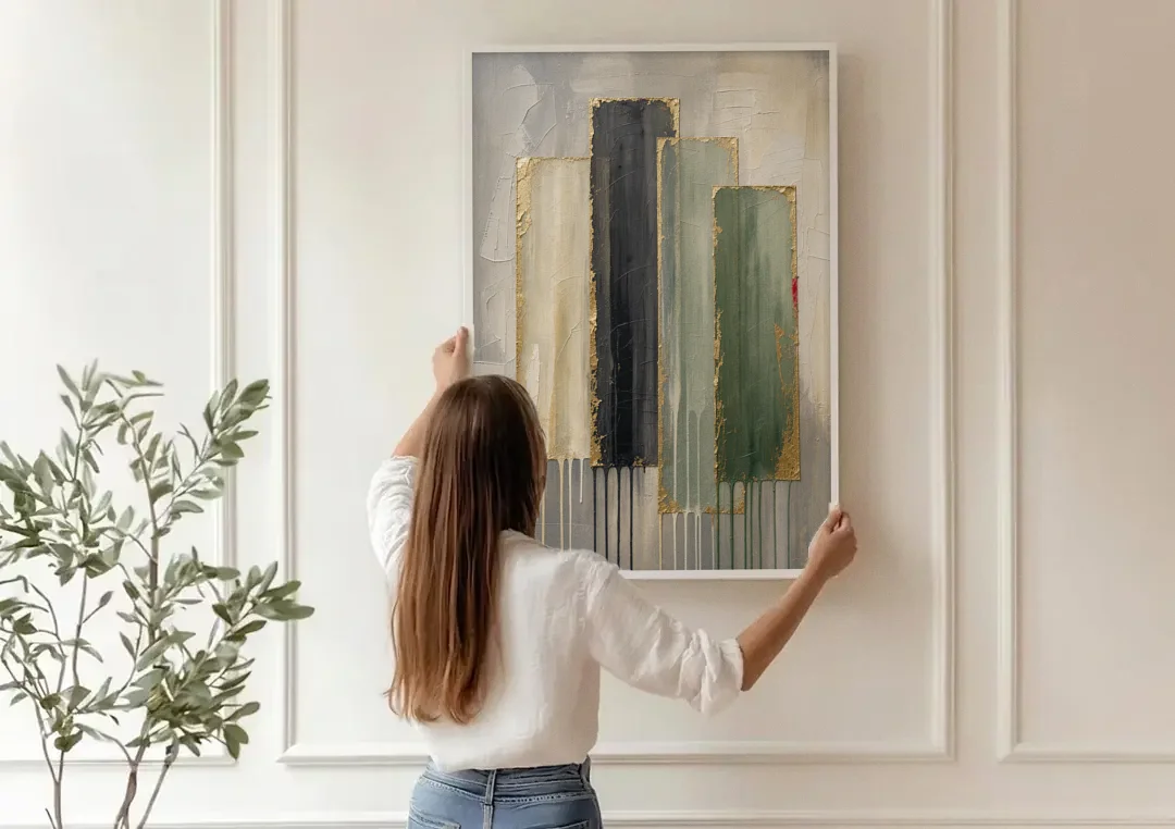 Modern Green and Gold Abstract Dripping Veils canvas wall art being hung on a paneled wall