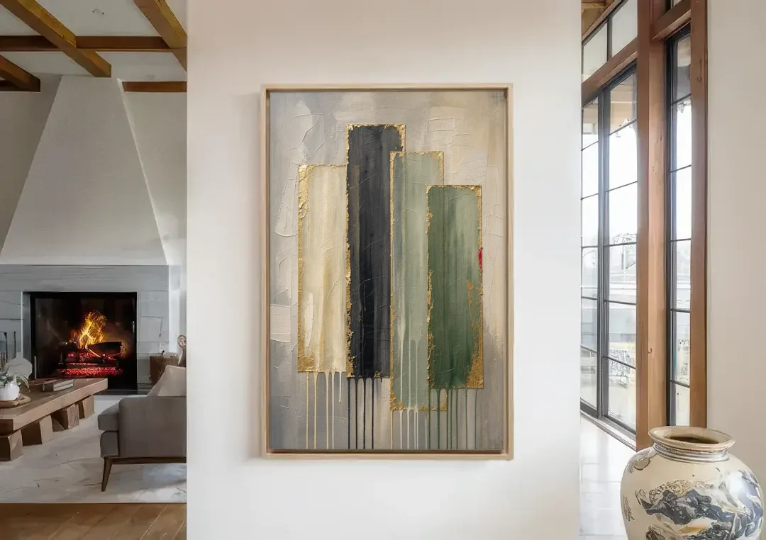 Modern Green and Gold Abstract Dripping Veils canvas wall art in a living room with a fireplace