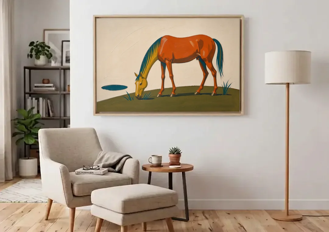 Modern Horse Wall Art of a Grazing Chestnut canvas wall art above an armchair in a bright living room