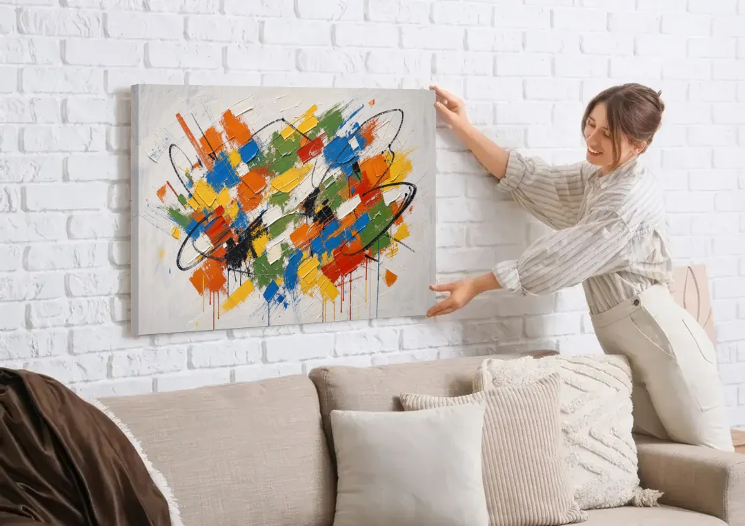 Modern Looping Color Dabs for the Living Room canvas wall art being hung on a white brick wall above a sofa