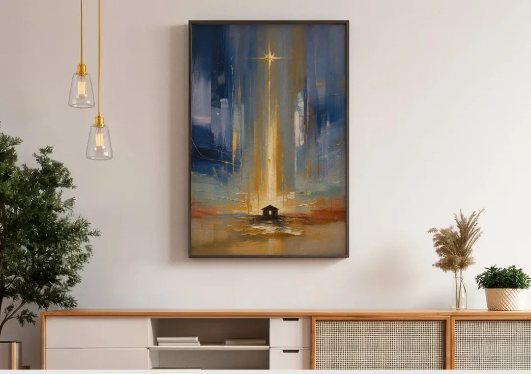 Modern Nativity Painting with Falling Gold Light canvas wall art above a wooden sideboard under pendant lights