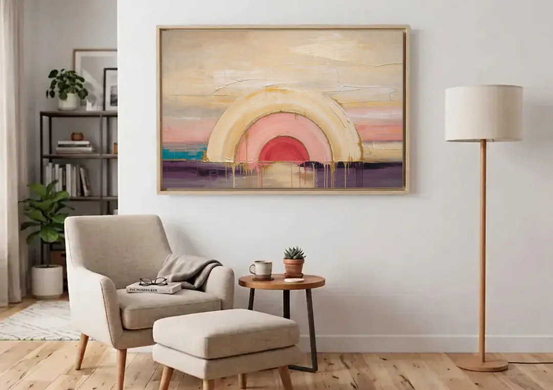 Modern Neutral Nested Blush Arches canvas wall art above an armchair in a bright living room