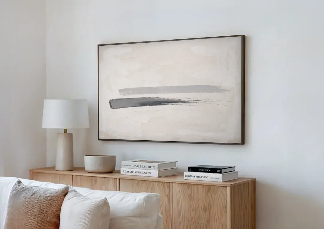 Modern Office Wall Decor with One Graphite Stroke canvas wall art above a wooden sideboard next to a sofa