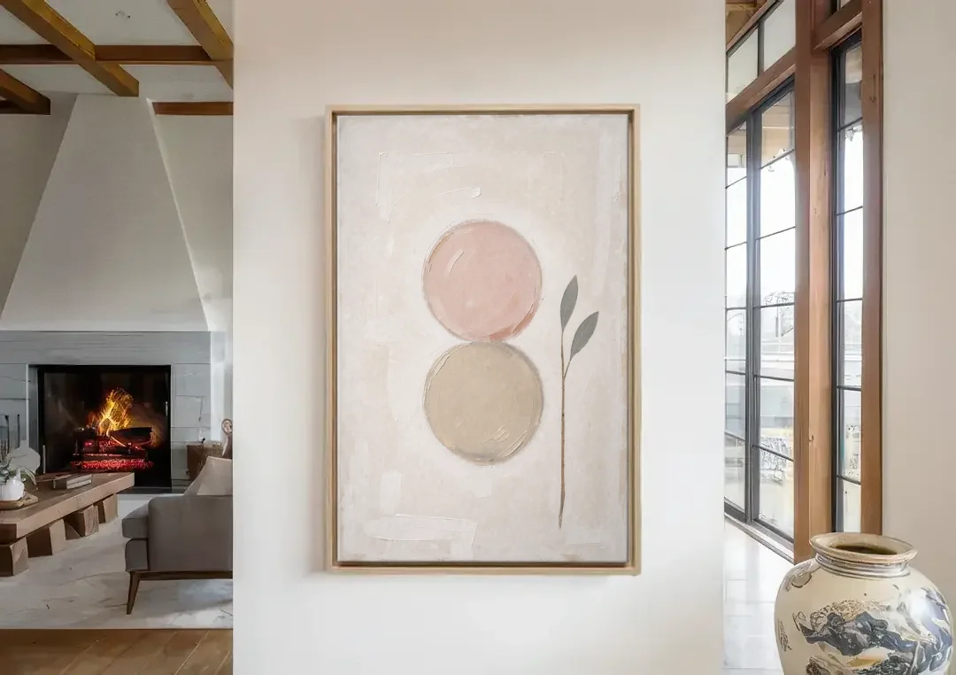 Modern Organic Wall Art with Blush and Clay Circles canvas wall art in a living room with a fireplace