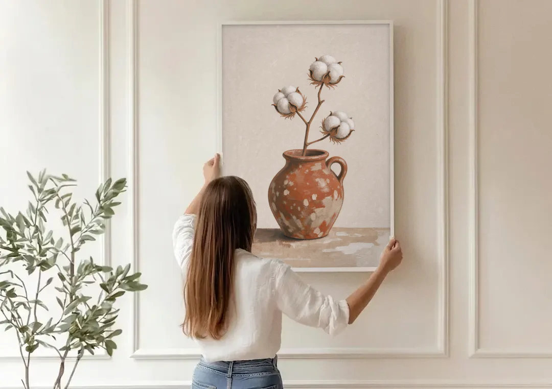 Modern Rustic Wall Art with Cotton in a Jug canvas wall art being hung on a paneled wall