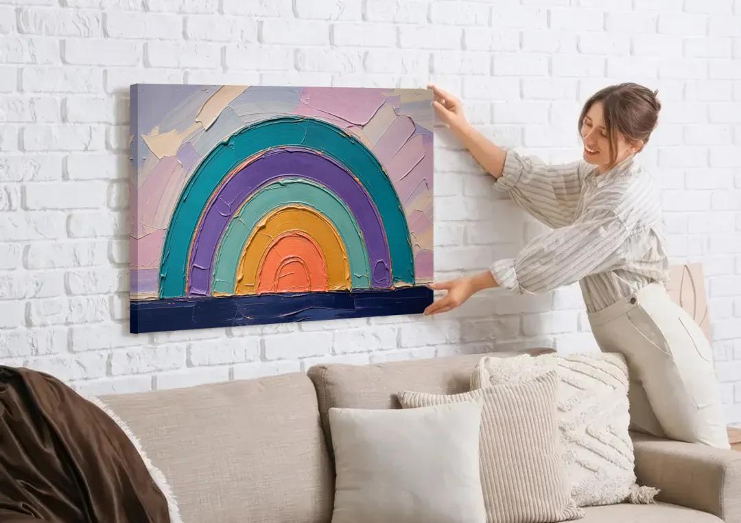 Modern Teal Abstract Nested Arches canvas wall art being hung on a white brick wall above a sofa