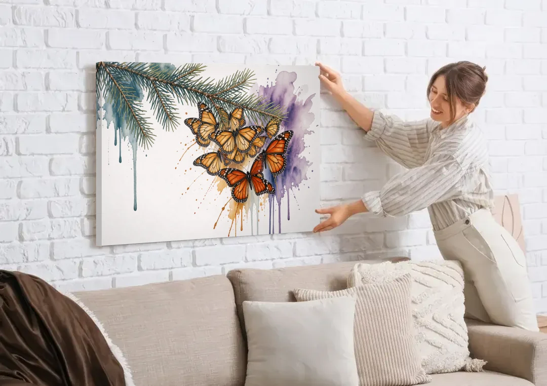Monarch Butterfly Canvas of a Winter Fir Cluster canvas wall art being hung on a white brick wall above a sofa