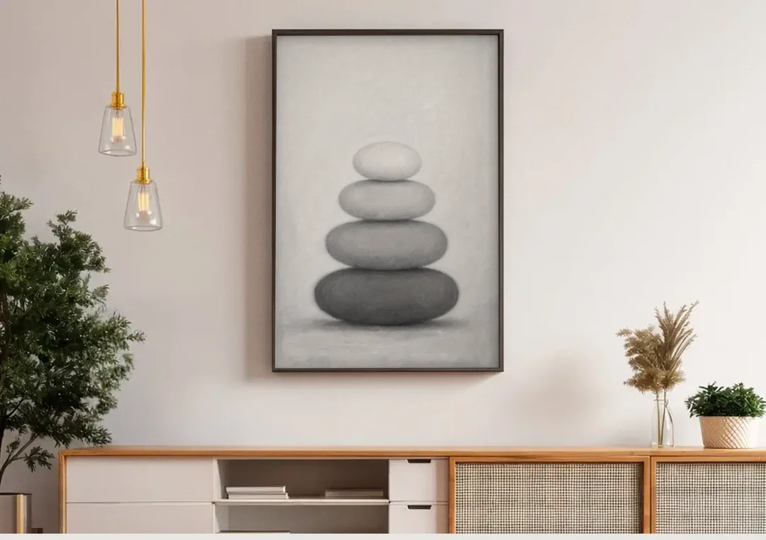 Monochrome Abstract Painting of Stacked Ovals canvas wall art above a wooden sideboard under pendant lights