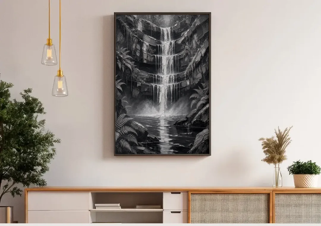 Monochrome Landscape Painting of a Tiered Waterfall canvas wall art above a wooden sideboard under pendant lights