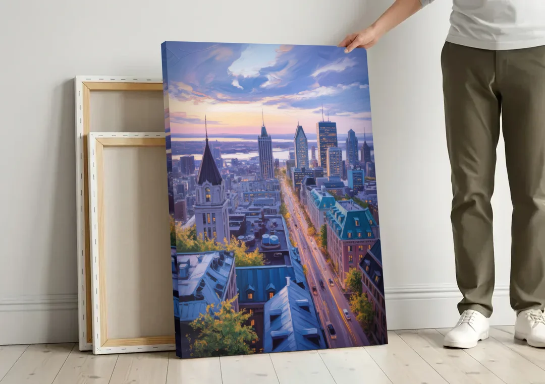 Montreal Rooftop View canvas wall art leaning against a wall next to blank canvases