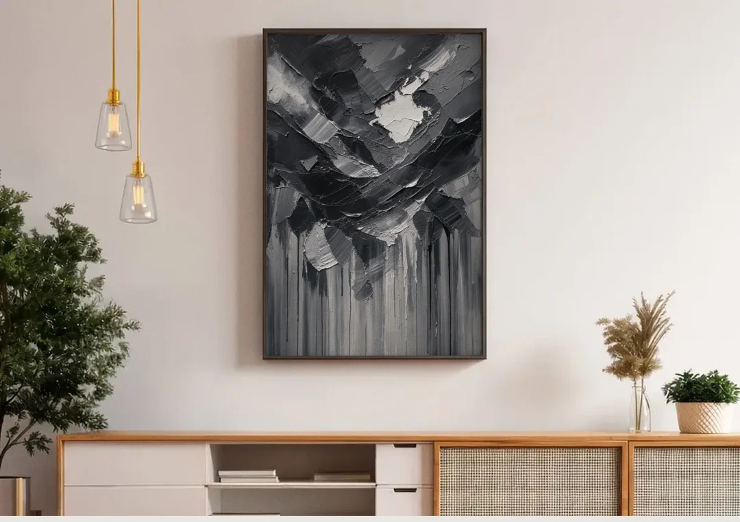 Moody Abstract Storm Tear in Charcoal Impasto canvas wall art above a wooden sideboard under pendant lights