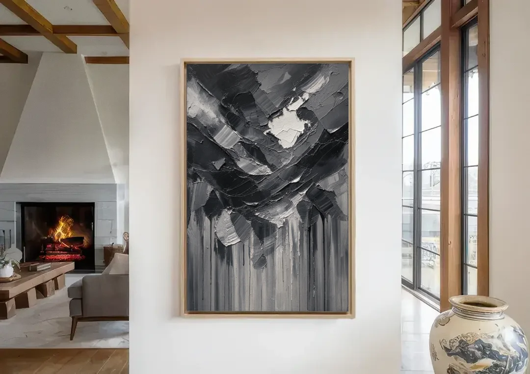 Moody Abstract Storm Tear in Charcoal Impasto canvas wall art in a living room with a fireplace