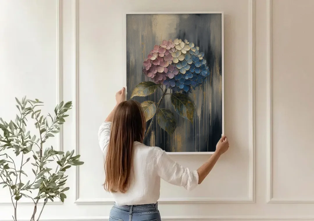 Moody Floral Wall Art of a Drooping Hydrangea canvas wall art being hung on a paneled wall
