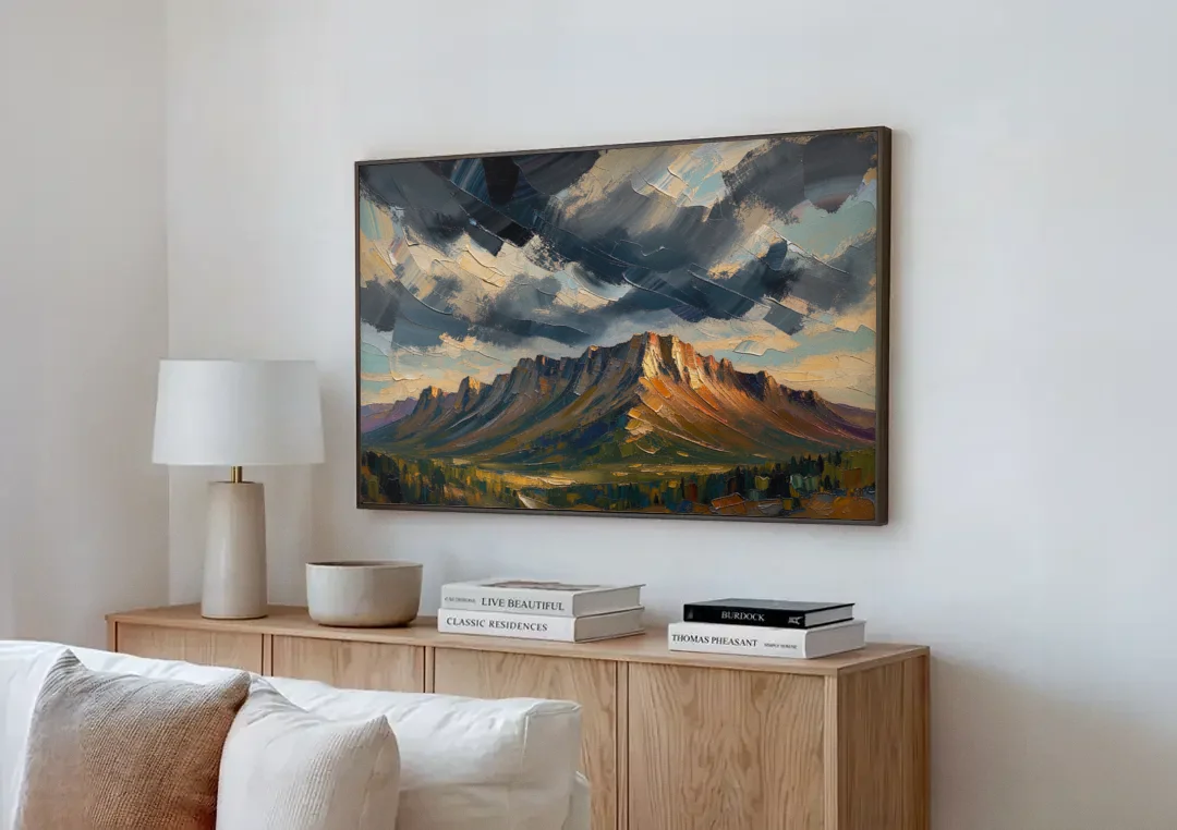 Moody Landscape Painting of the Storm Ridge canvas wall art above a wooden sideboard next to a sofa