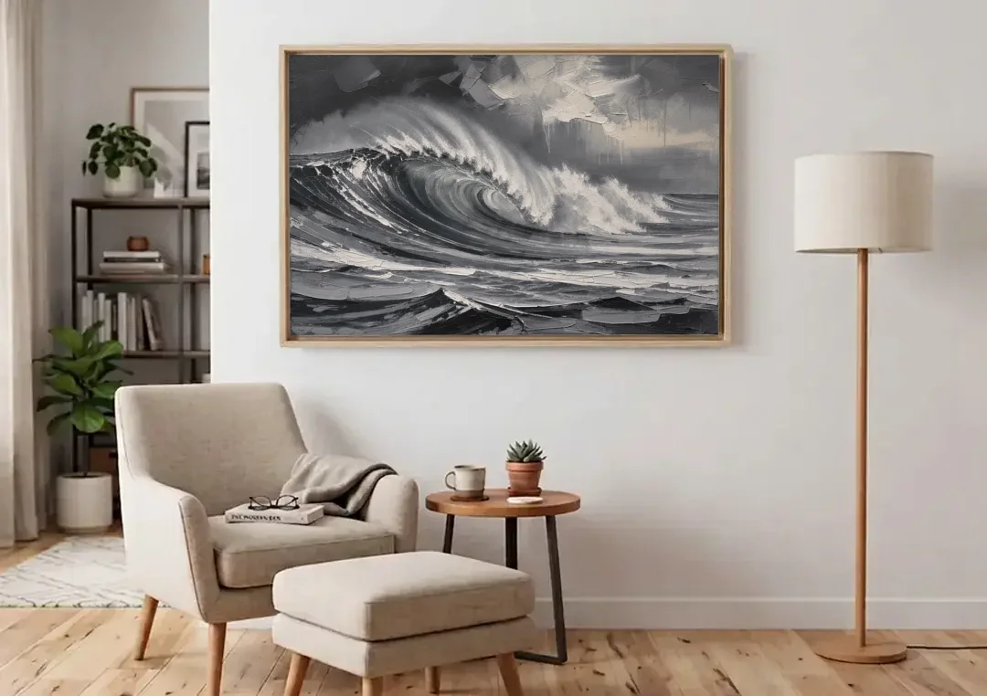 Moody Wall Art of a Breaking Storm Wave canvas wall art above an armchair in a bright living room