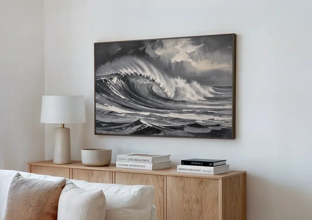 Moody Wall Art of a Breaking Storm Wave canvas wall art above a wooden sideboard next to a sofa