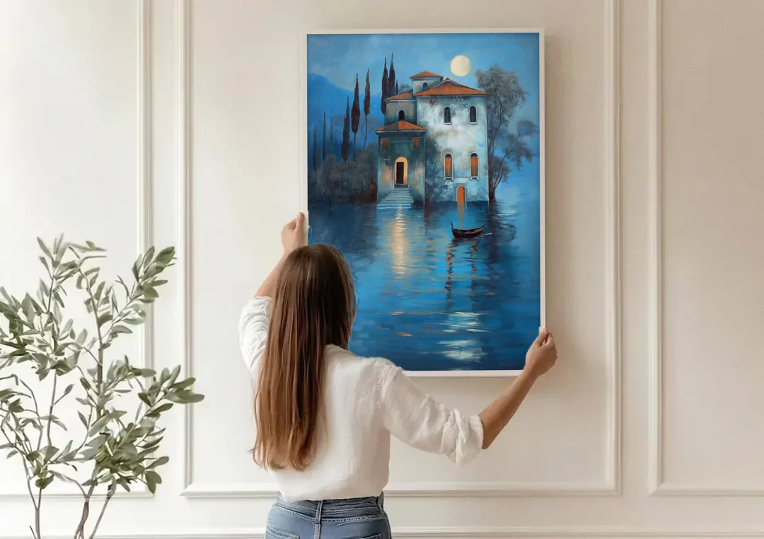 Moonlight Painting of a Lakeside Villa canvas wall art being hung on a paneled wall