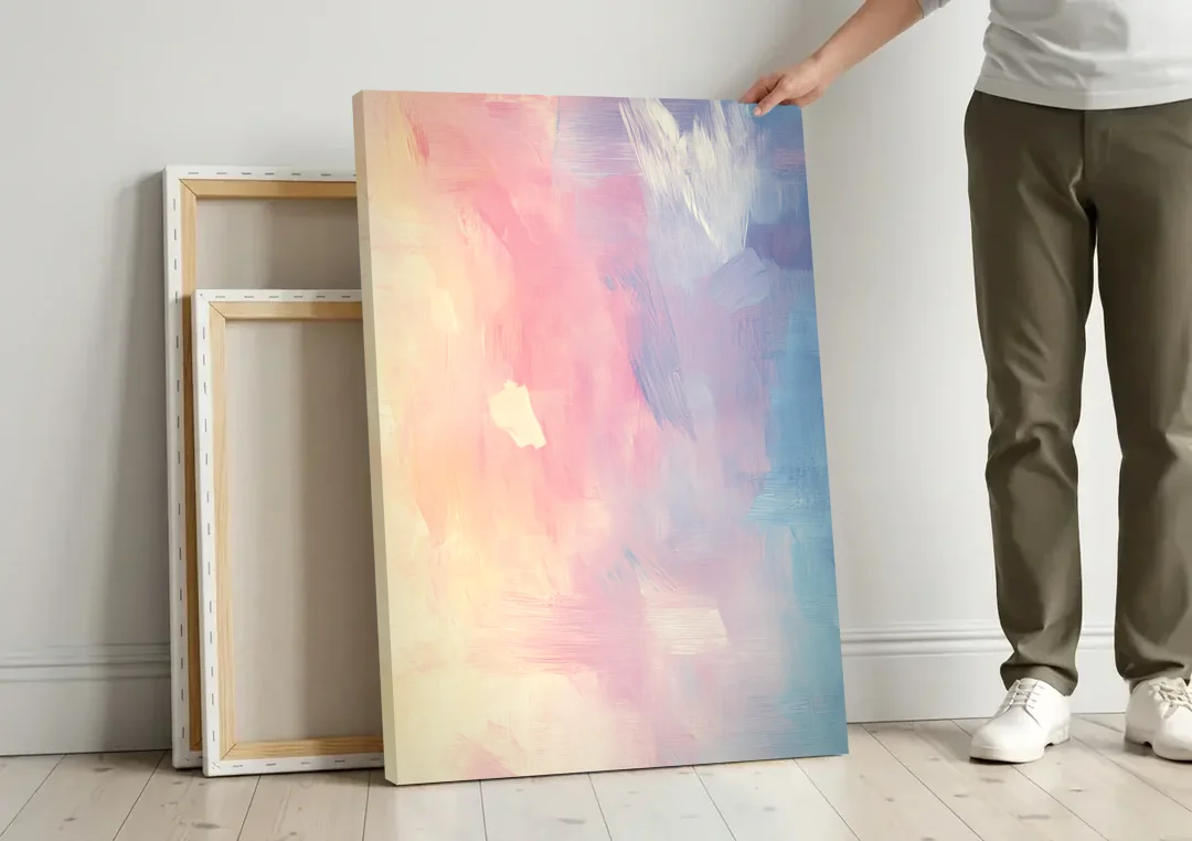 Morning Glow canvas wall art leaning against a wall next to blank canvases