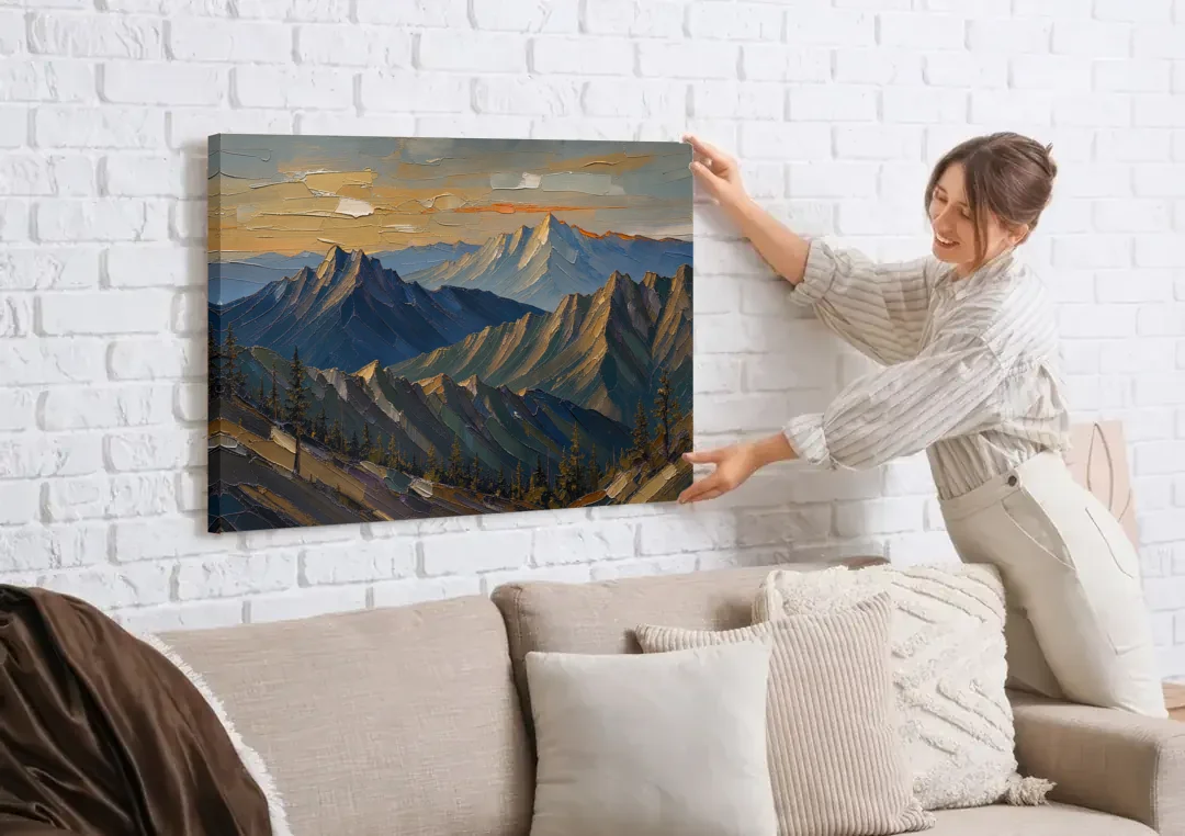 Mountain Wall Art of Three Ridges at Dusk canvas wall art being hung on a white brick wall above a sofa
