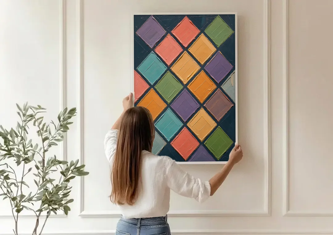 Multicolor Abstract Harlequin Diamond Impasto canvas wall art being hung on a paneled wall