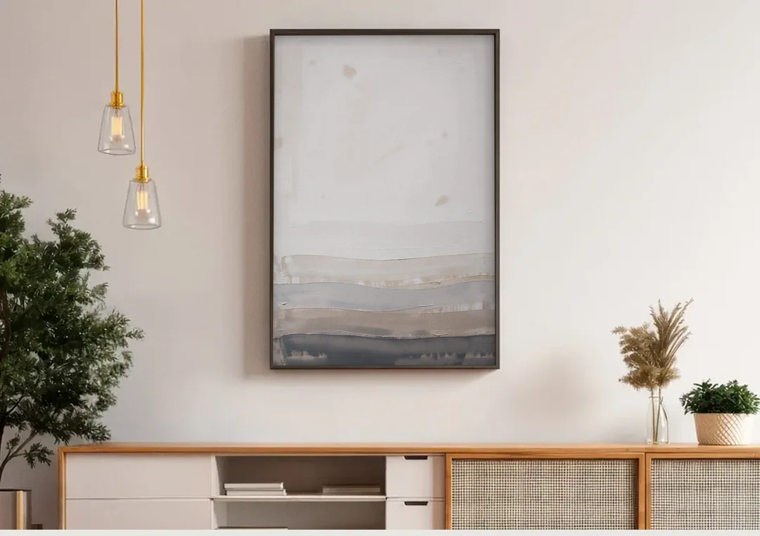 Muted Abstract Wall Art of Rising Morning Haze canvas wall art above a wooden sideboard under pendant lights